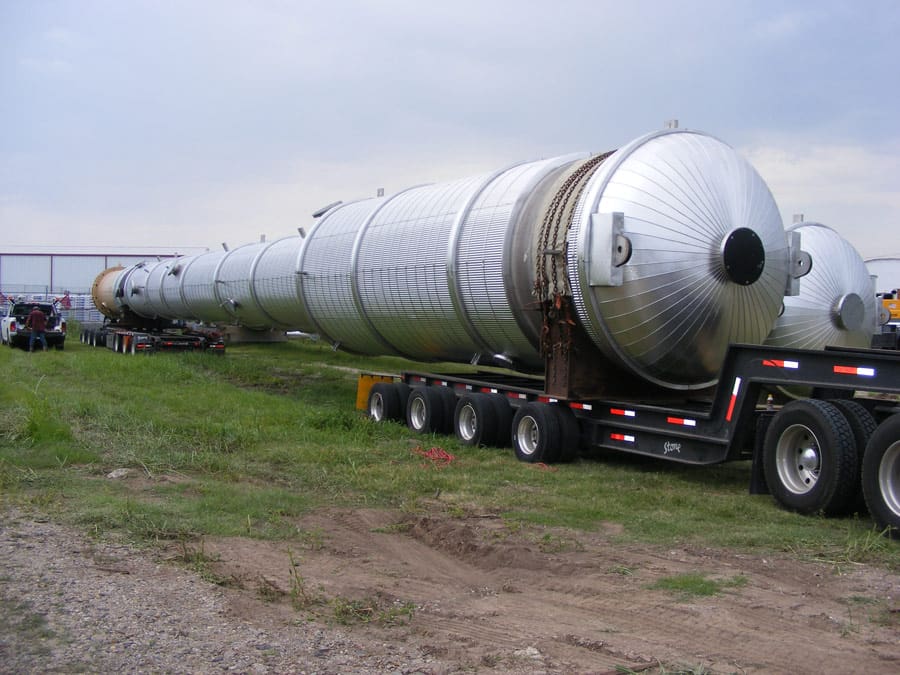 A pressure vessel loaded on a truck.