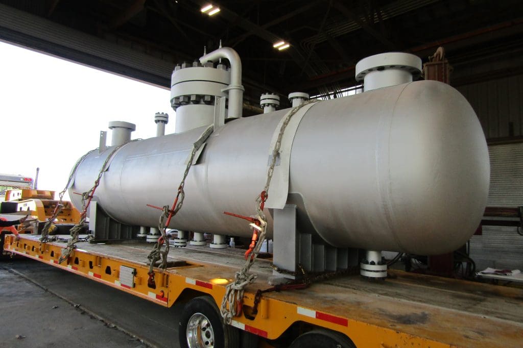 a pressure vessel loaded onto a trailer