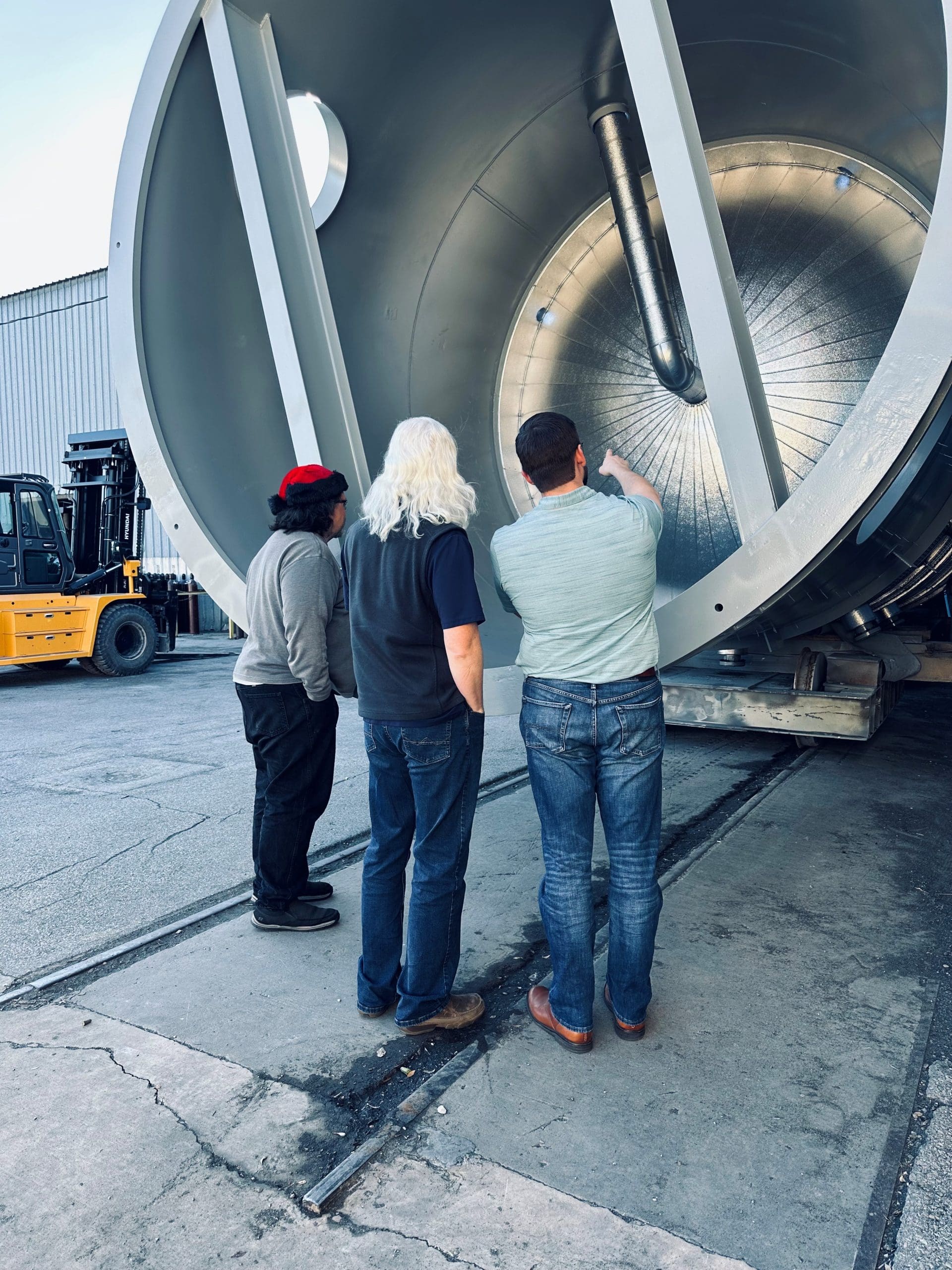 team inspecting inside of pressure vessel